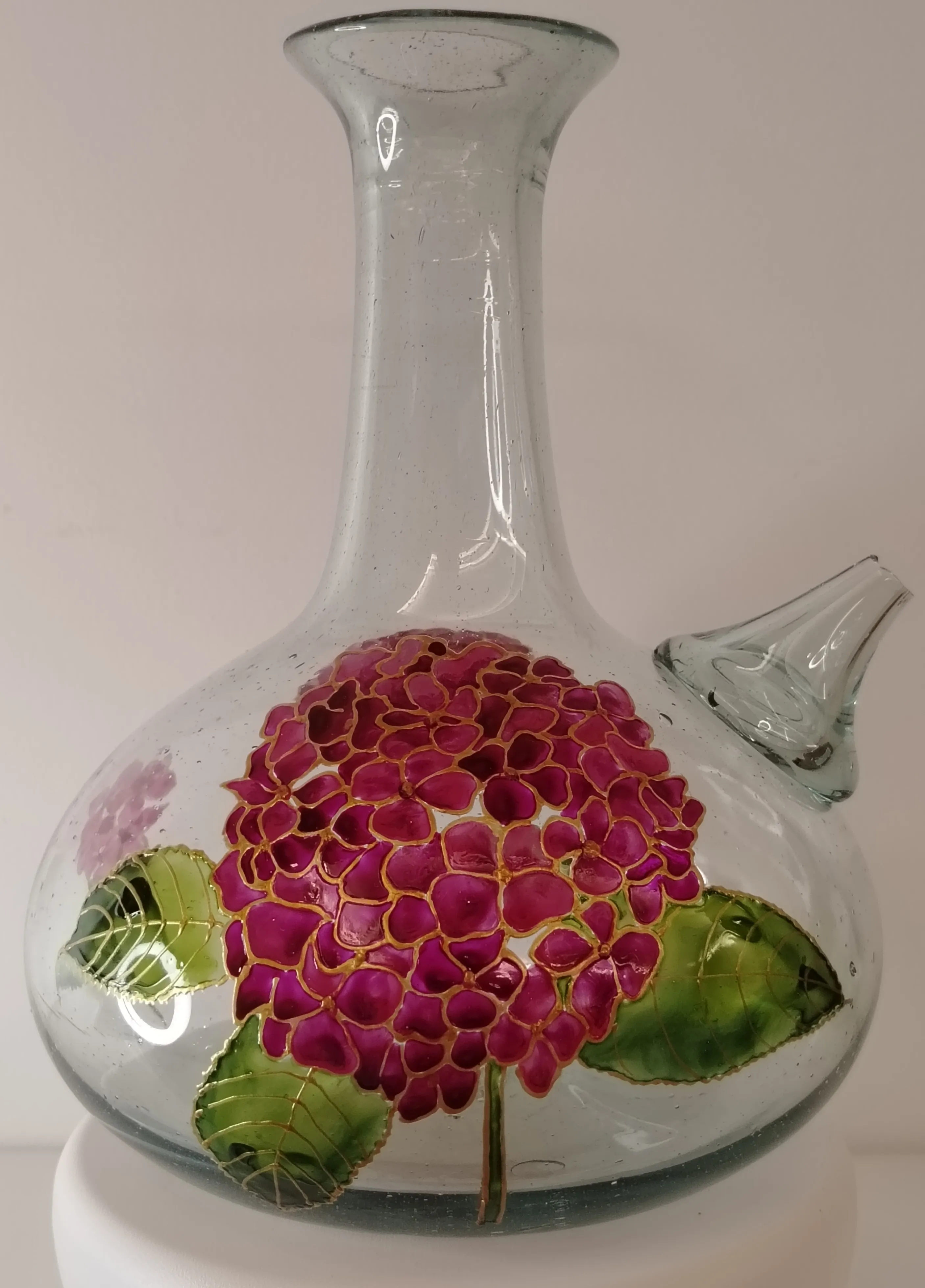 Angled detail of the pink hydrangea jug showing brushwork and gold outlines